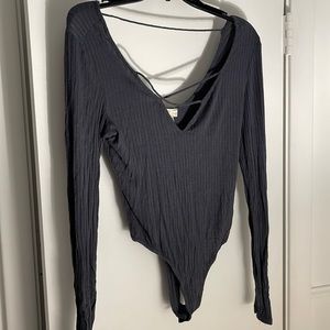 Wet seal long sleeve bodysuit